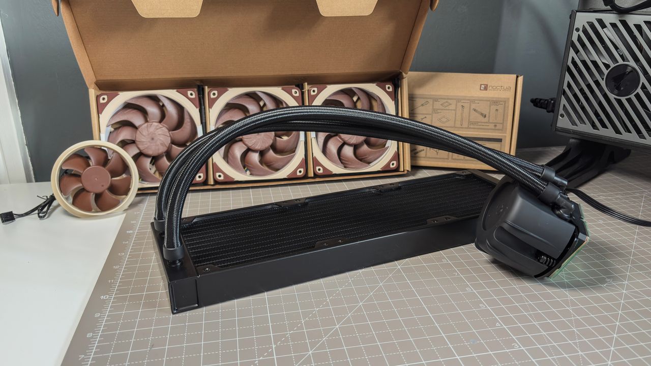 A Noctua NL-LC1 liquid cooler being installed on a test bench for testing.