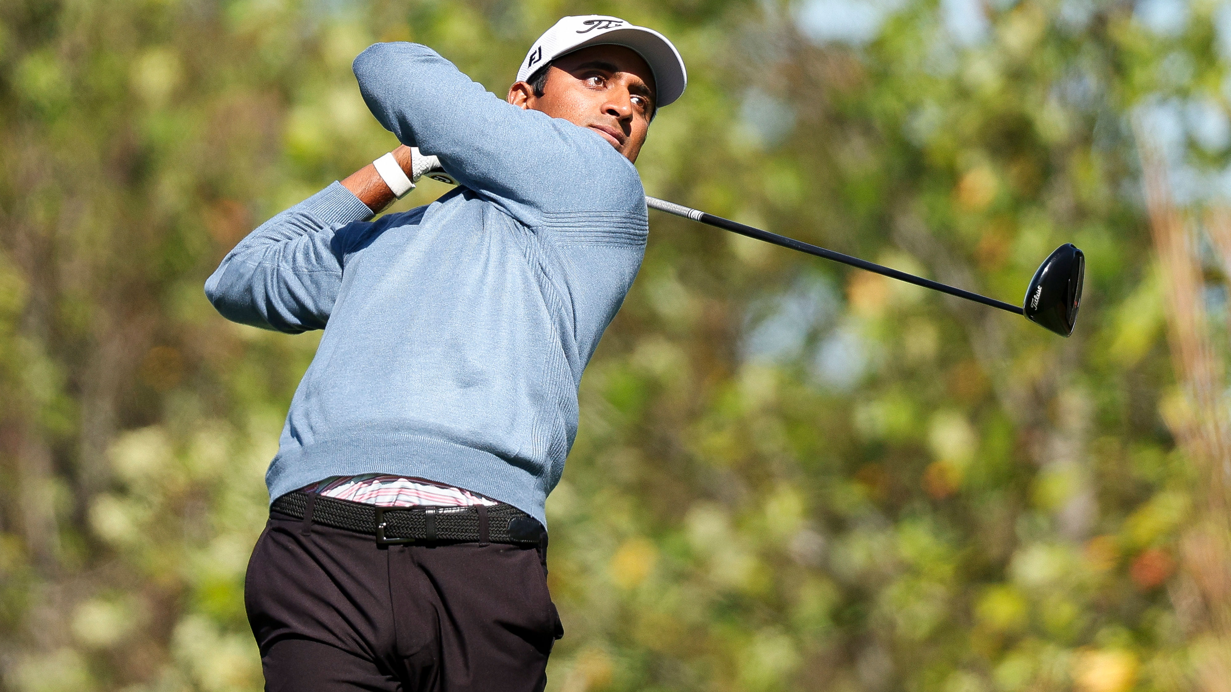 Sudarshan Yellamaraju of Canada hits a shot at the Korn Ferry Tour Championship