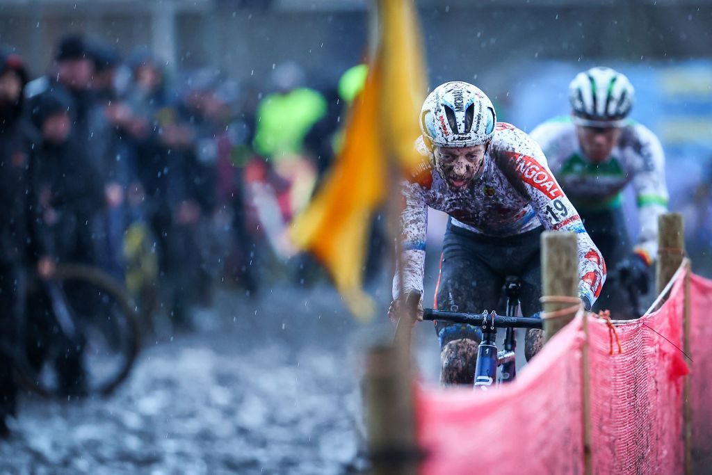 Belgian Michael Vanthourenhout and Belgian Laurens Sweeck pictured in action during the mens elite race of the Belgian national championships cyclocross