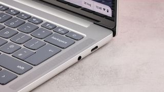 Close-up of right-hand ports on Lenovo Chromebook Plus 14-inch on desk