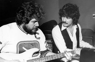 Randy Bachman (left) and piano player Burton Cummings of the rock band "The Guess Who" reunite musically to record Cummings' new album for the first time in seven years in 1977.