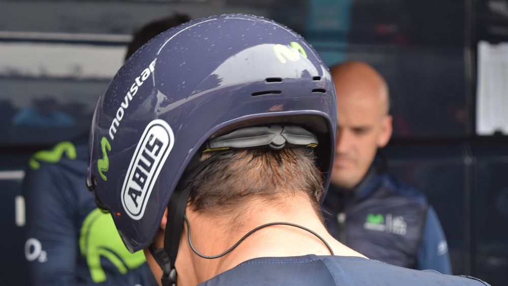 No issues with the radio ear piece fitting in the new helmet