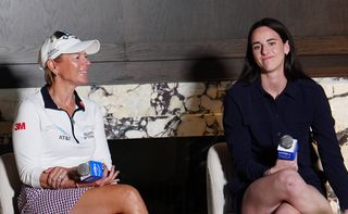 Caitlin Clark and Annika Sorenstam speaking at a summit