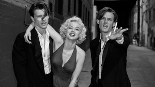 L-R: Cass Chaplin (Xavier Samuel), Marilyn Monroe (Ana de Armas) and Eddy G. Robinson Jr. (Evan Williams) in Blonde