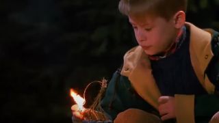 Kevin lighting fireworks in Home Alone 2: Lost in New York.