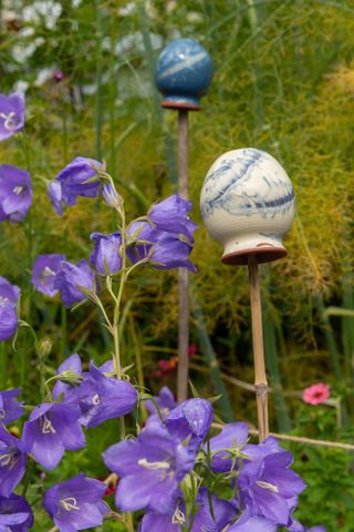 Garden in Bath campanula and ceramic cane toppers