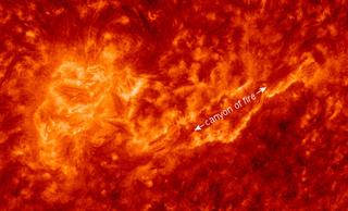 The 12,400 miles long canyon of fire that opened on the surface of the sun, spitting out filaments of charged plasma.
