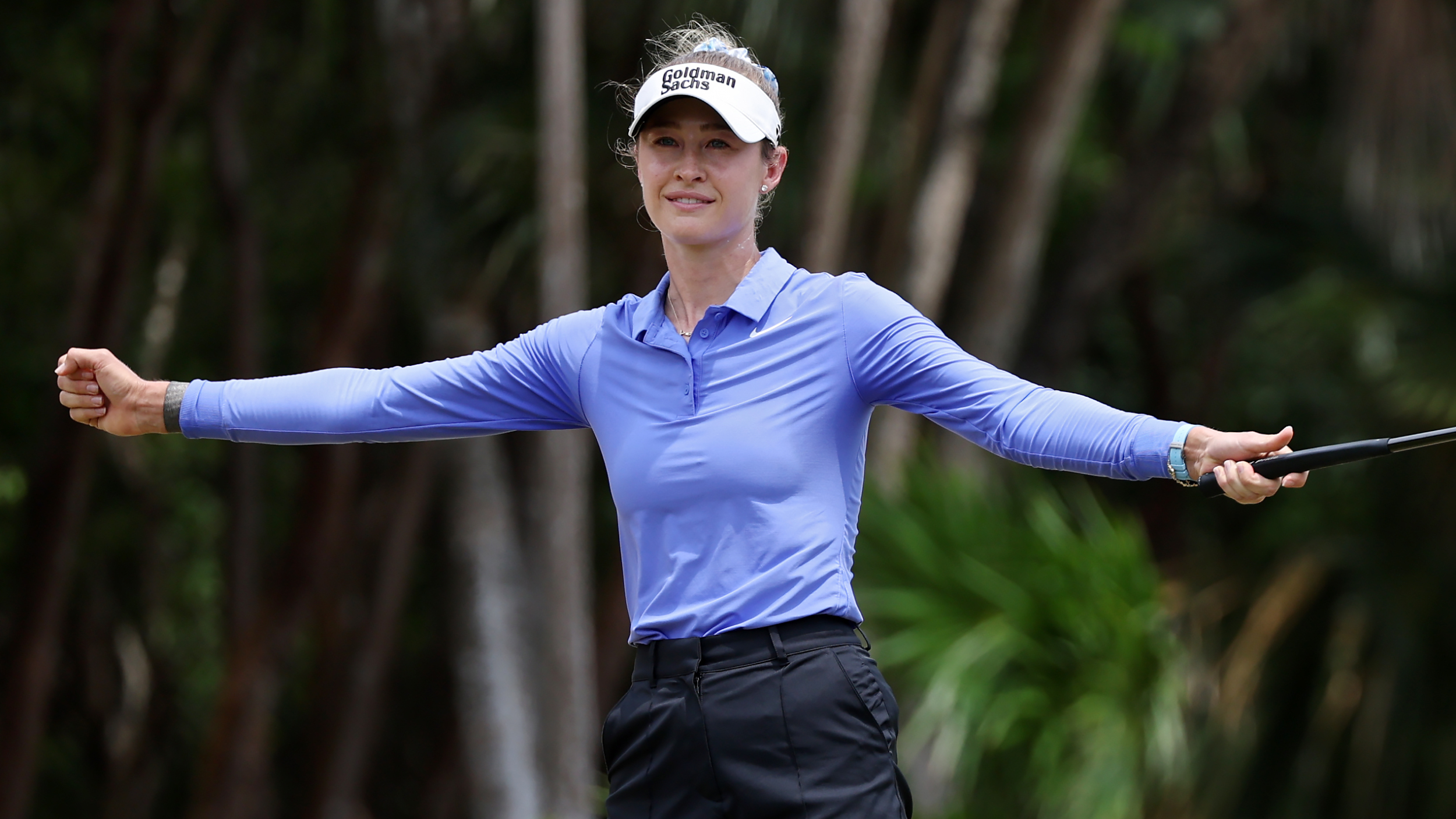 Nelly Korda celebrates winning the Riviera Maya Open