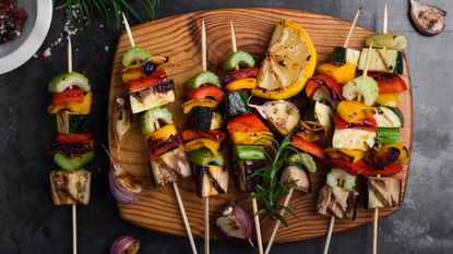 Colorful grilled summer seasonal vegetables skewers - stock photo