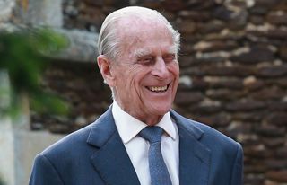 Prince Philip, Duke of Edinburgh leaves the Church of St Mary Magdalene on the Sandringham Estate for the Christening of Princess Charlotte of Cambridge