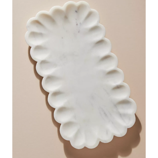 marble trinket tray with scalloped rim