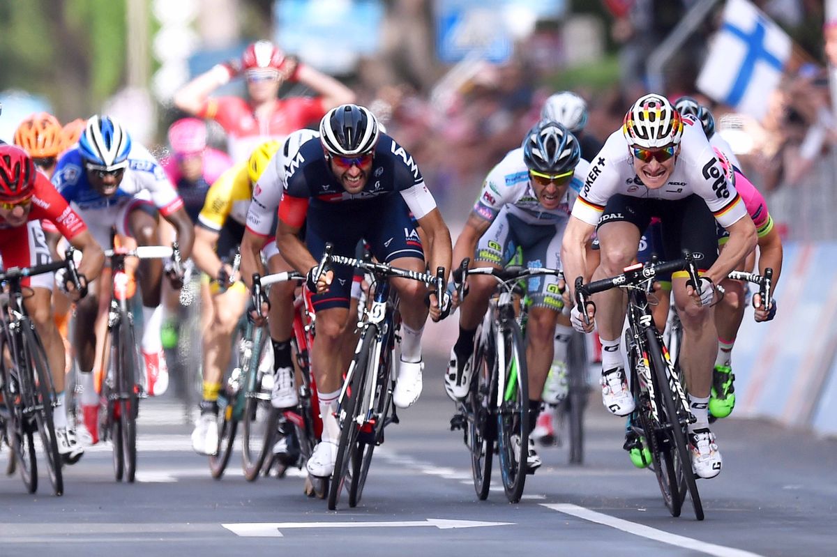 Andr&eacute; Greipel (Lotto Soudal) beats Matteo Pelucchi (IAM Cycling) to the stage win
