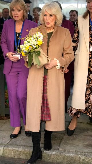 Queen Camilla leaves after a visit to a women's refuge on January 22, 2024 in Swindon, England
