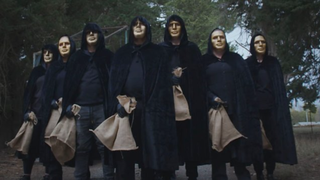 People dressed in cloaks and masks in The Traitors NZ season 2