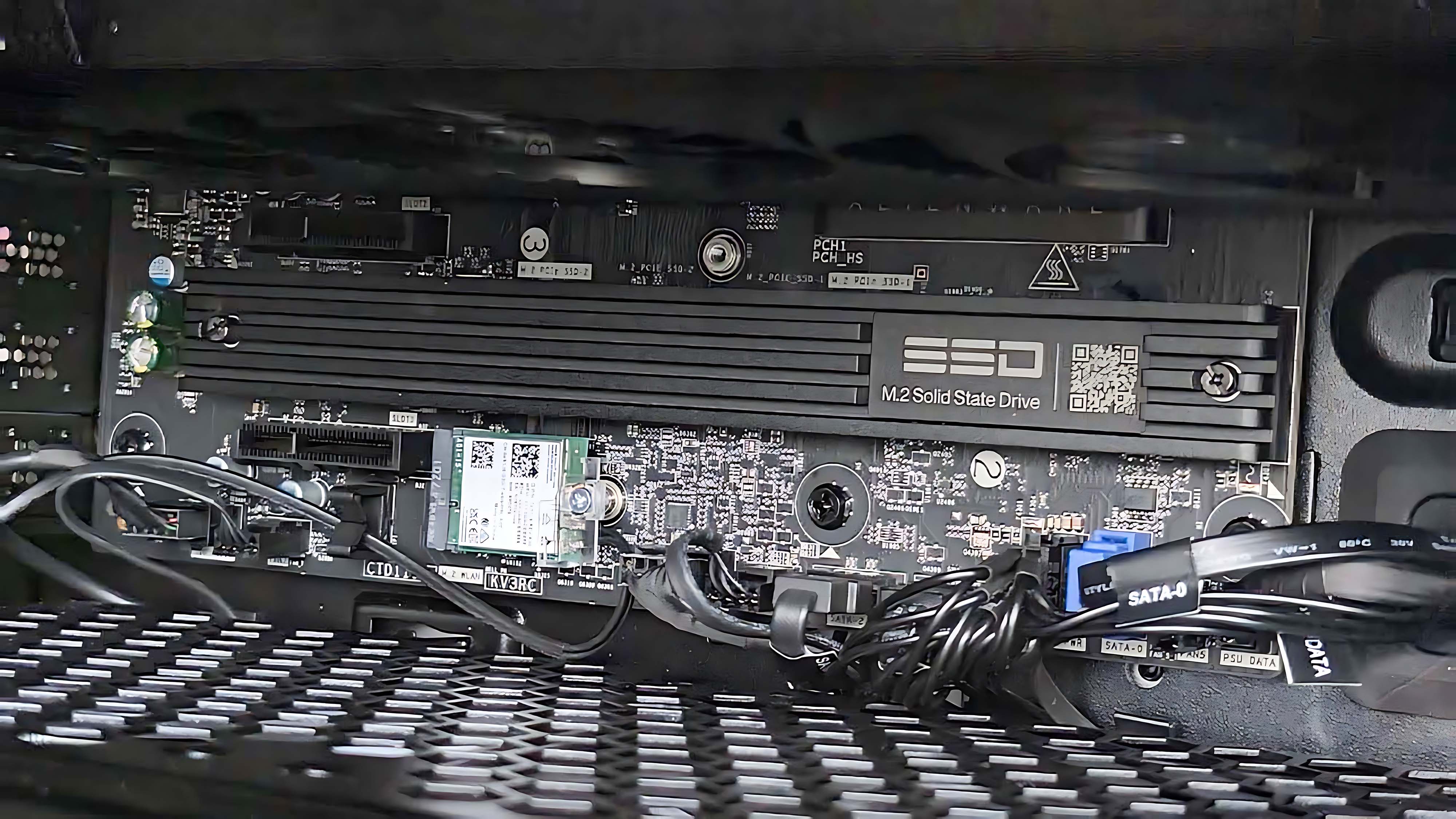 A closeup of the larger SSD inside the Alienware Area-51 Gaming Desktop (2025).