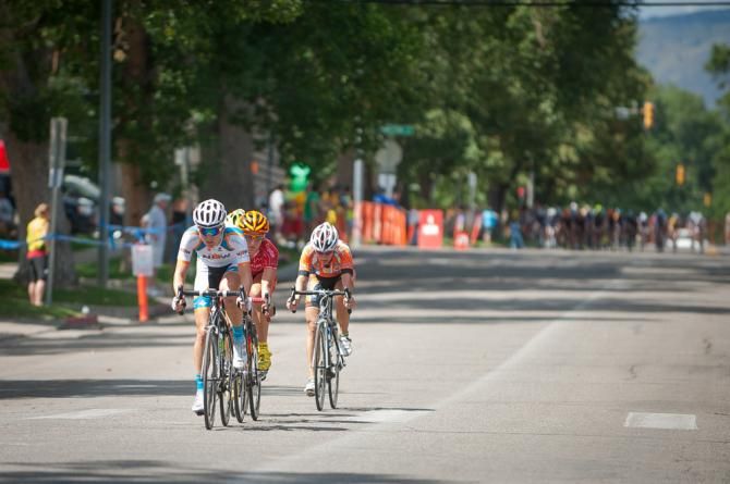 A four rider break makes its way down East Olive Street of Old Town Fort Collins.