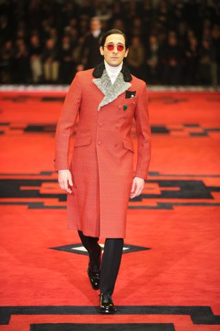 Adrian Brody on the runway at Prada's fall 2012 show