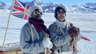 Ben Fogle and Dwayne Fields wrapped up in winter outfits in front of a British flag for Endurance: Race to the Pole