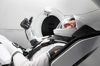 European Space Agency (ESA) astronaut Matthias Maurer gives a thumbs up from his seat aboard SpaceX's Crew Dragon "Endurance."