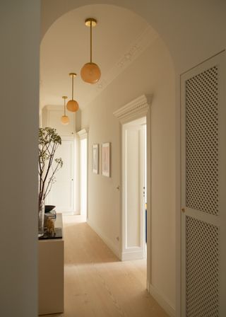 Apartment entryway with arched doors