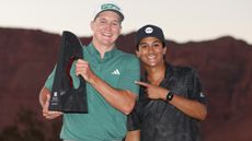 Matt McCarty and Devrath Das with the Black Desert Championship trophy