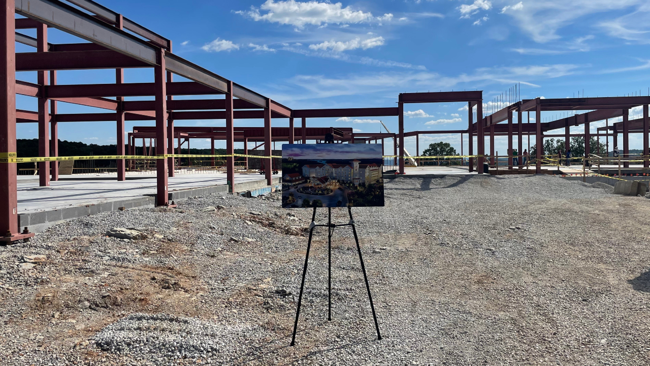 A rendering of the Silver Dollar City Resort in front of the construction site.