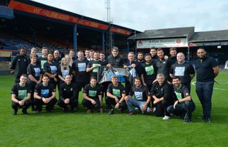 Luton town staff member staking part in Prostate United