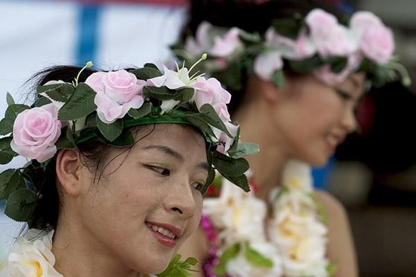 Floral headware for dancers in Xinglong.