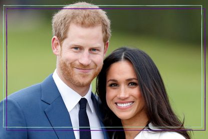 Prince Harry and Meghan Markle smiling with their arms around each other for an official photocall to announce their engagement at The Sunken Gardens, Kensington Palace on November 27, 2017 in London, England. 