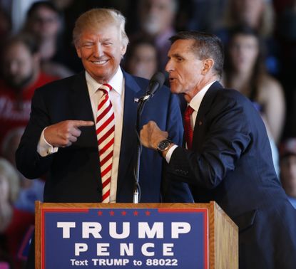 President Trump points toward Michael Flynn