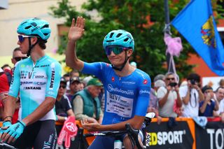 Italian rider Giulio Pellizzari of VF Group-Bardiani CSF-Faizane wears the mountains classification jersey before stage 19 at the Giro d&#039;Italia 