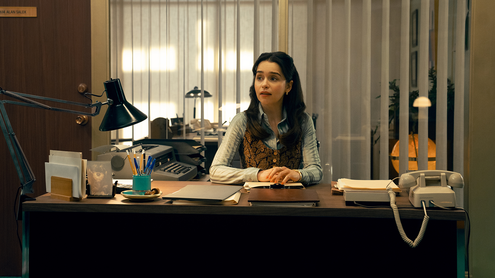 Bea sitting at a desk in Ponies