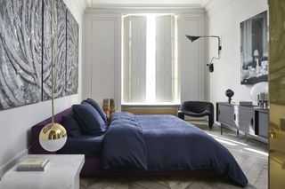 Luxury bedroom with statement lighting
