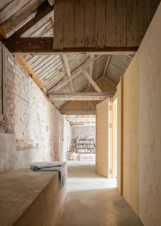 View of the corridor in the sleeping barn