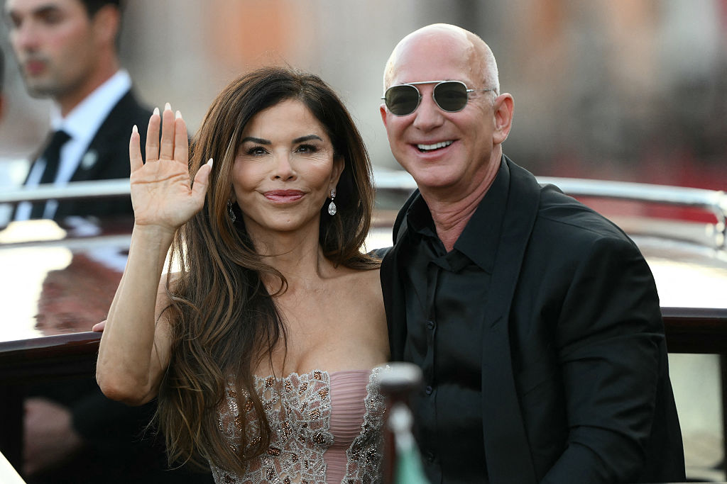 Amazon's founder Jeff Bezos and spouse Lauren Sanchez Bezos leave the Aman Hotel