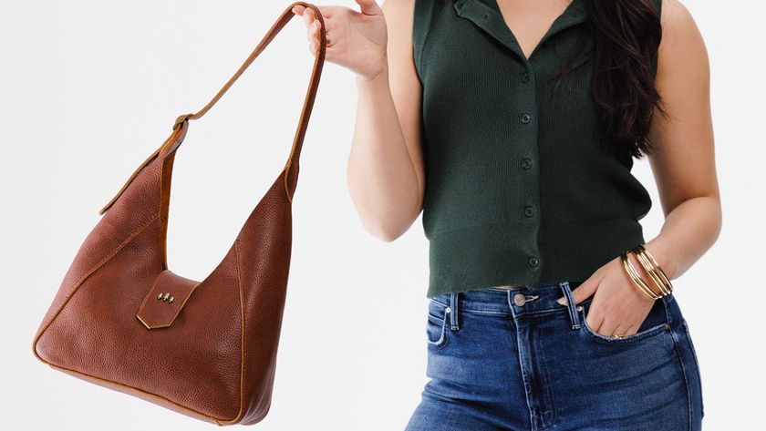 Woman holding a Portland Leather bag