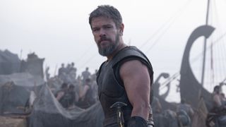 Odysseus looks across the beach of Troy