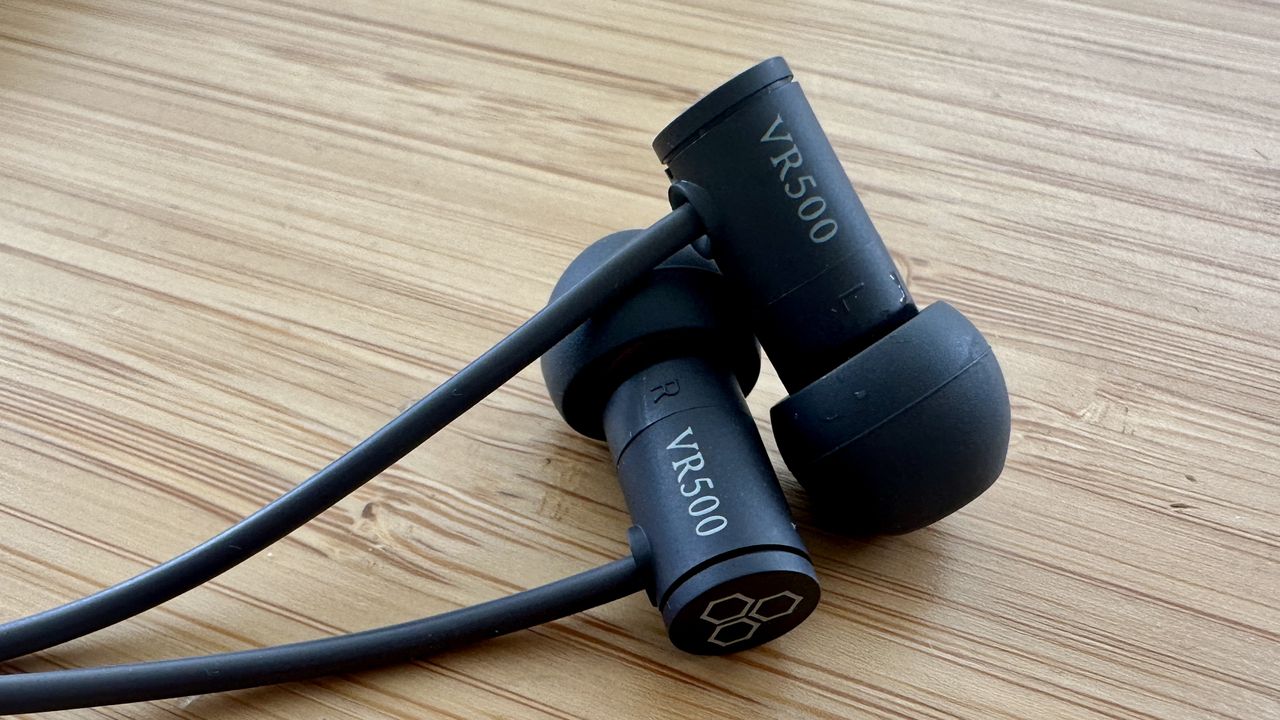 Final VR500 headphones on a wooden table
