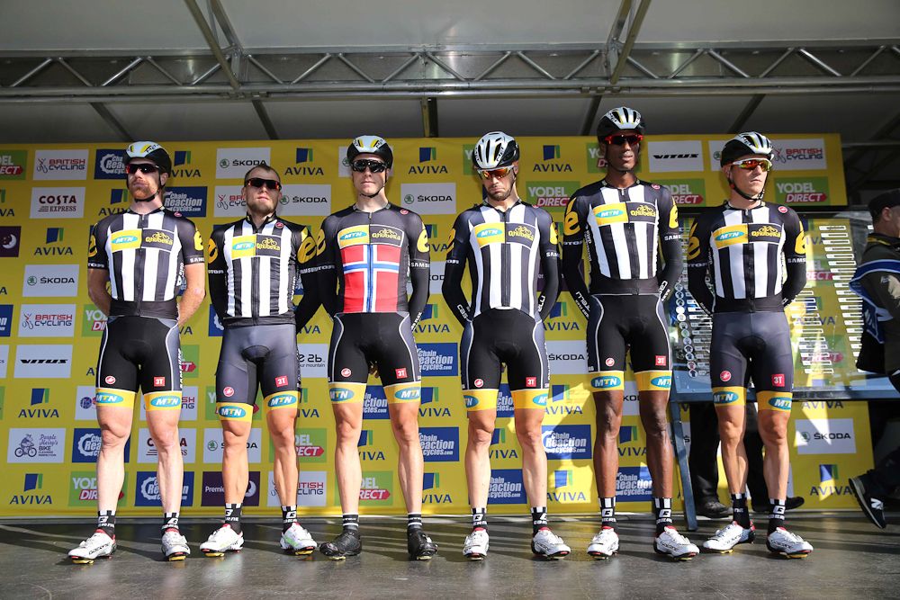MTN-Qhubeka sign in before the start of stage 3.