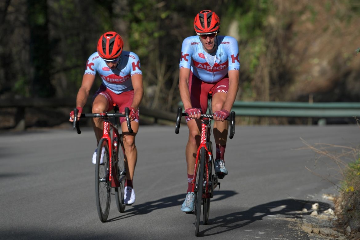 Katusha-Alpecin teammates Simon &Scaron;pilak and Nils Politt ride up the Col de Turini