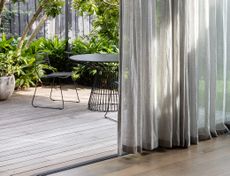 A long curtain touching the floor