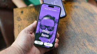 iOS 17 contact poster on iPhone in purple showing author's name Philip Berne