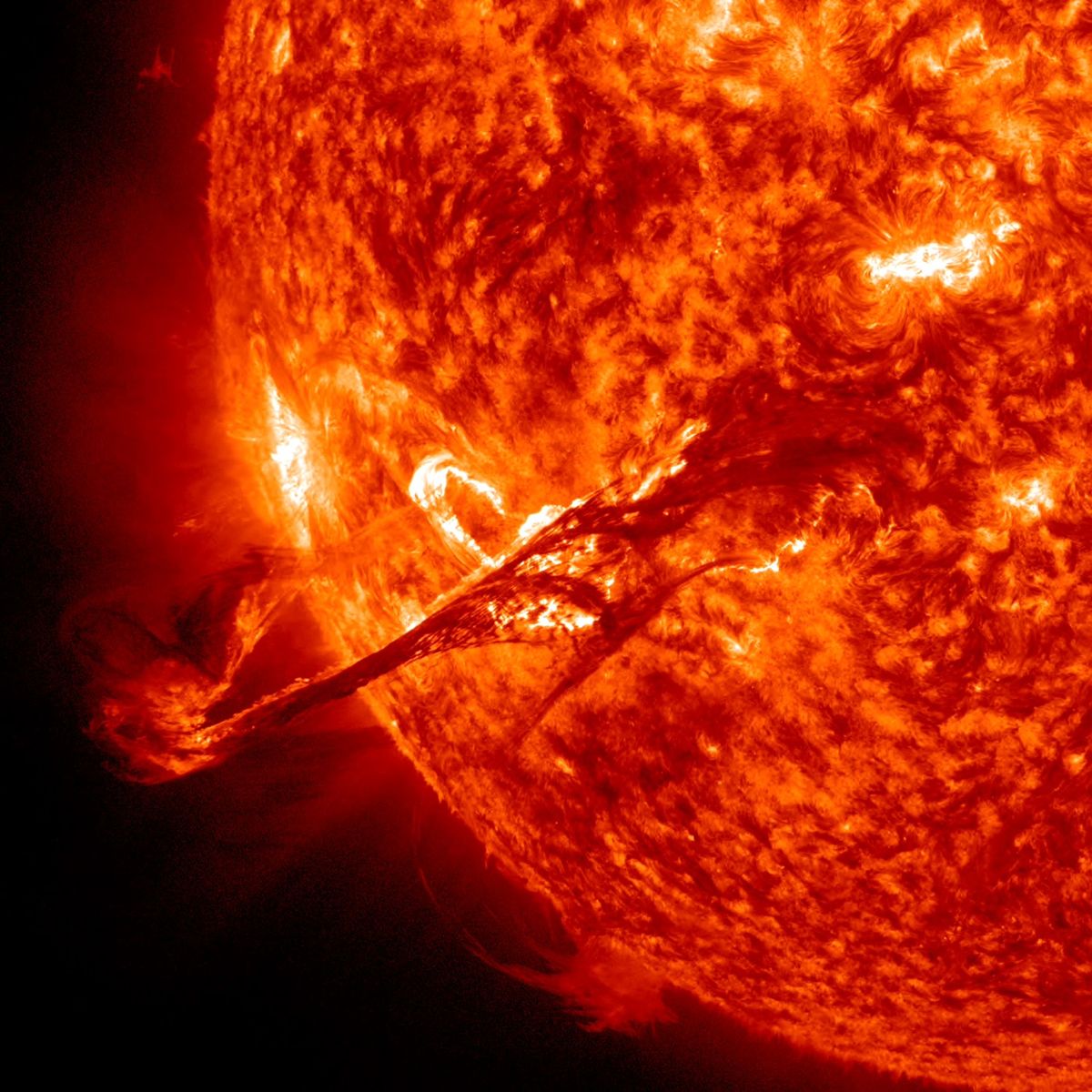 Big Sun Storms and Little Solar Burps Have the Same Trigger Space