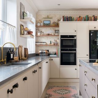 cream kitchen with grey worktops