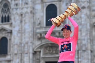 MILANO ITALY OCTOBER 25 Podium Tao Geoghegan Hart of The United Kingdom and Team INEOS Grenadiers Pink Leader Jersey Celebration Trophy Duomo di Milano Milan Cathedral during the 103rd Giro dItalia 2020 Stage 21 a 157km Individual time trial from Cernusco sul Naviglio to Milano ITT girodiitalia Giro on October 25 2020 in Milano Italy Photo by Stuart FranklinGetty Images