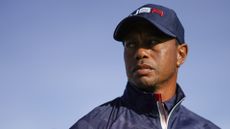 Tiger Woods looks on during his foursomes match on the second day of the 42nd Ryder Cup at Le Golf National Course at Saint-Quentin-en-Yvelines, south-west of Paris, on September 29, 2018.