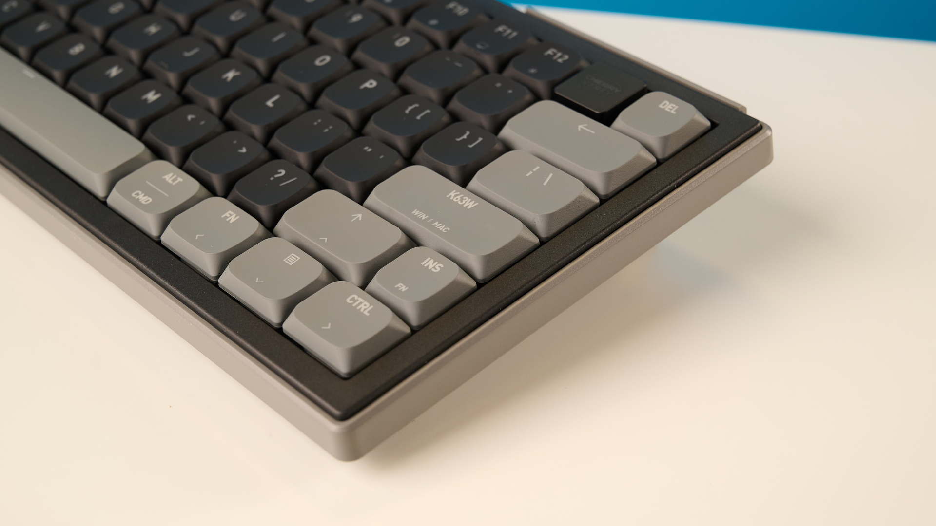 A black Cherry XTRFY K63W Pro Compact mechanical gaming keyboard