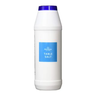 White bottle of table salt with a blue label on the front, on a white background