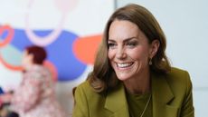 Catherine, Princess of Wales plays with children as she visits the charity Home-Start Oxford