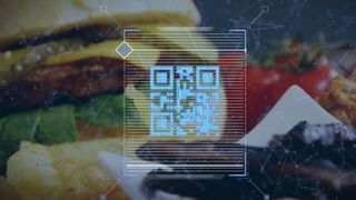QR code over a fast food meal